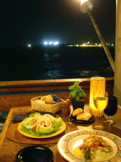 Enjoy the beautiful Kona sunsets and fine cuisine of Chef Loetree while dining on the water in Kailua-Kona at Huggo's.