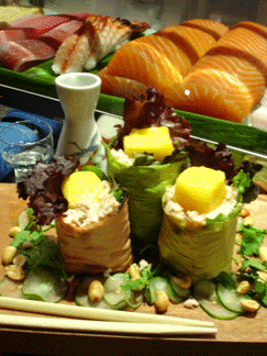 Mango Crab Salad Handroll (a Sansei original), Fresh Hawaiian Ahi & Asian Rock Shrimp Cake (another Sansei original), and the delicious 69 Roll.