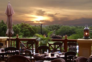 Enjoy glorious sunsets while you dine on the lanai at Tommy Bahama's on the Big Island